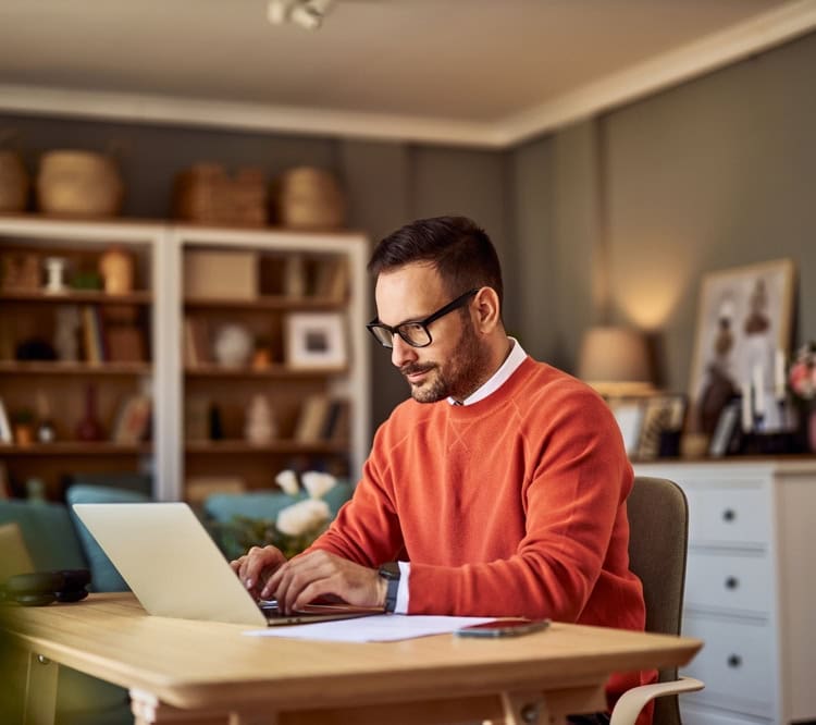 A,Focused,And,Diligent,Adult,Male,Online,Content,Writer,Typing self employed man on laptop